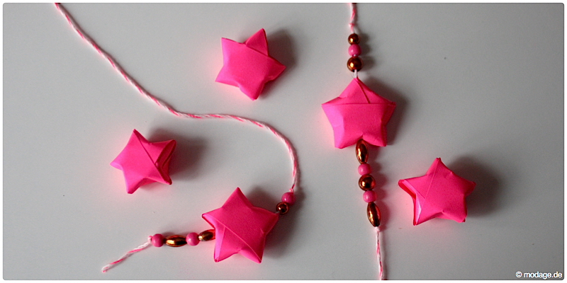 Sterne aus Papier basteln Sterne basteln Weihnachtssterne Plissee basteln Anleitung neonpink Garnundmehr 10